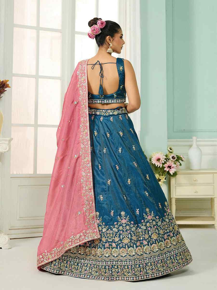 Teal Cosmos Silk Embroidered Wedding Reception Festival Heavy Border Lehenga Choli
