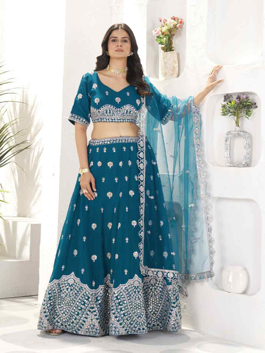 Teal Faux Georgette Embroidered Wedding Festival Heavy Border Lehenga Choli