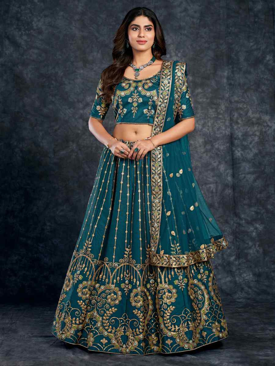 Teal Green Italian Silk Embroidered Wedding Festival Heavy Border Lehenga Choli