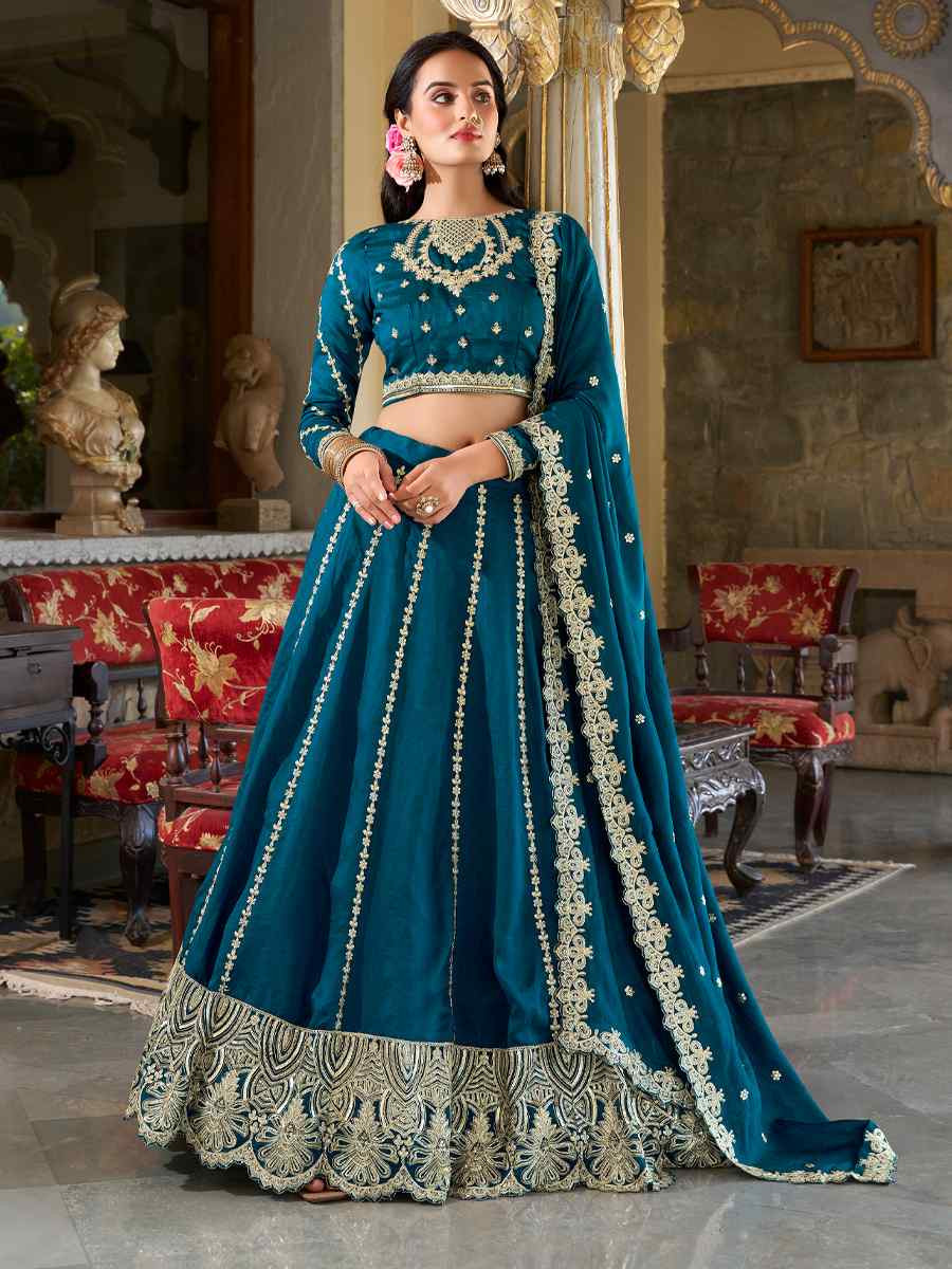 Teal Moonga Silk Embroidery Reception Party Wear Heavy Border Lehenga Choli