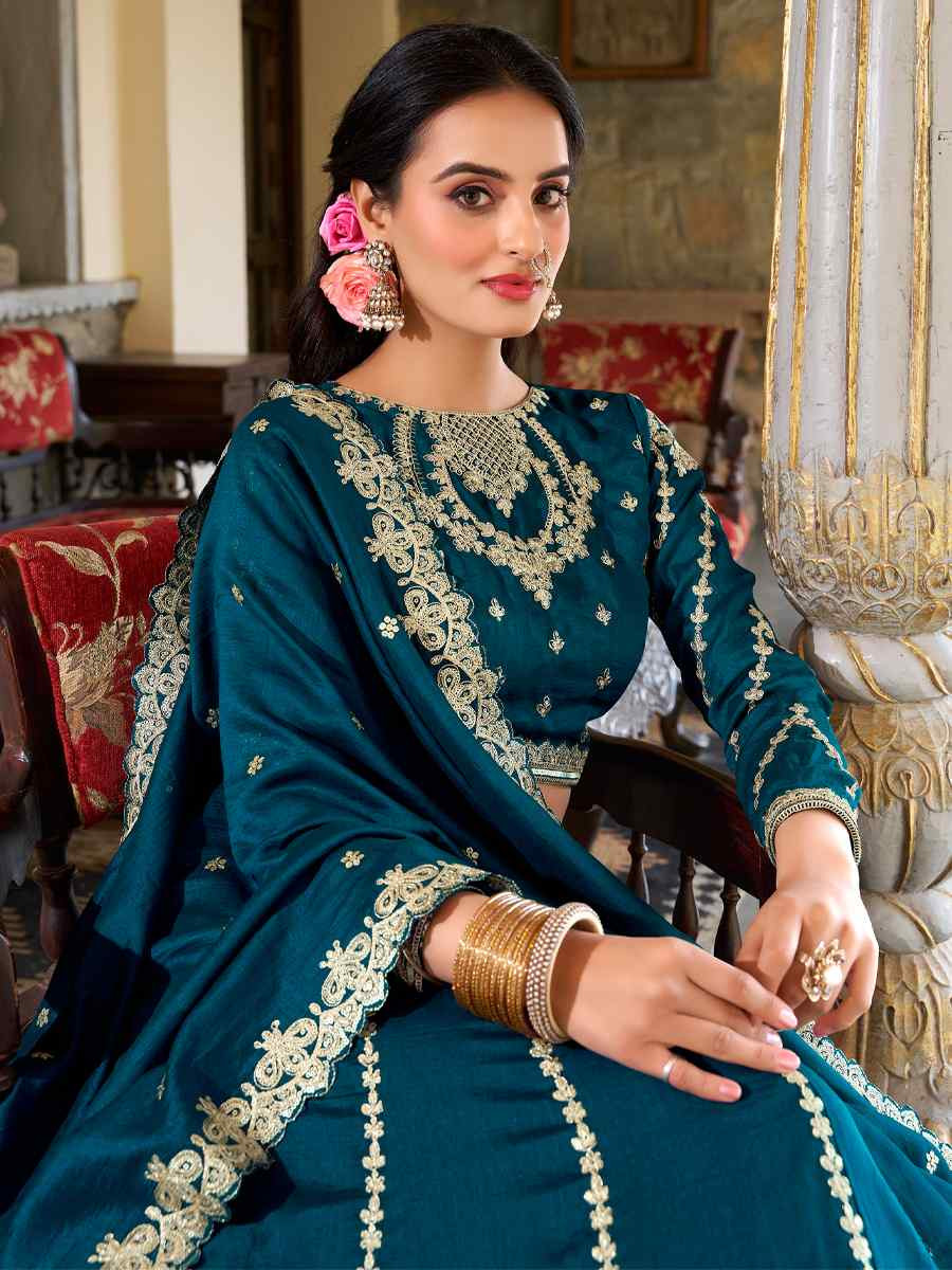 Teal Moonga Silk Embroidery Reception Party Wear Heavy Border Lehenga Choli