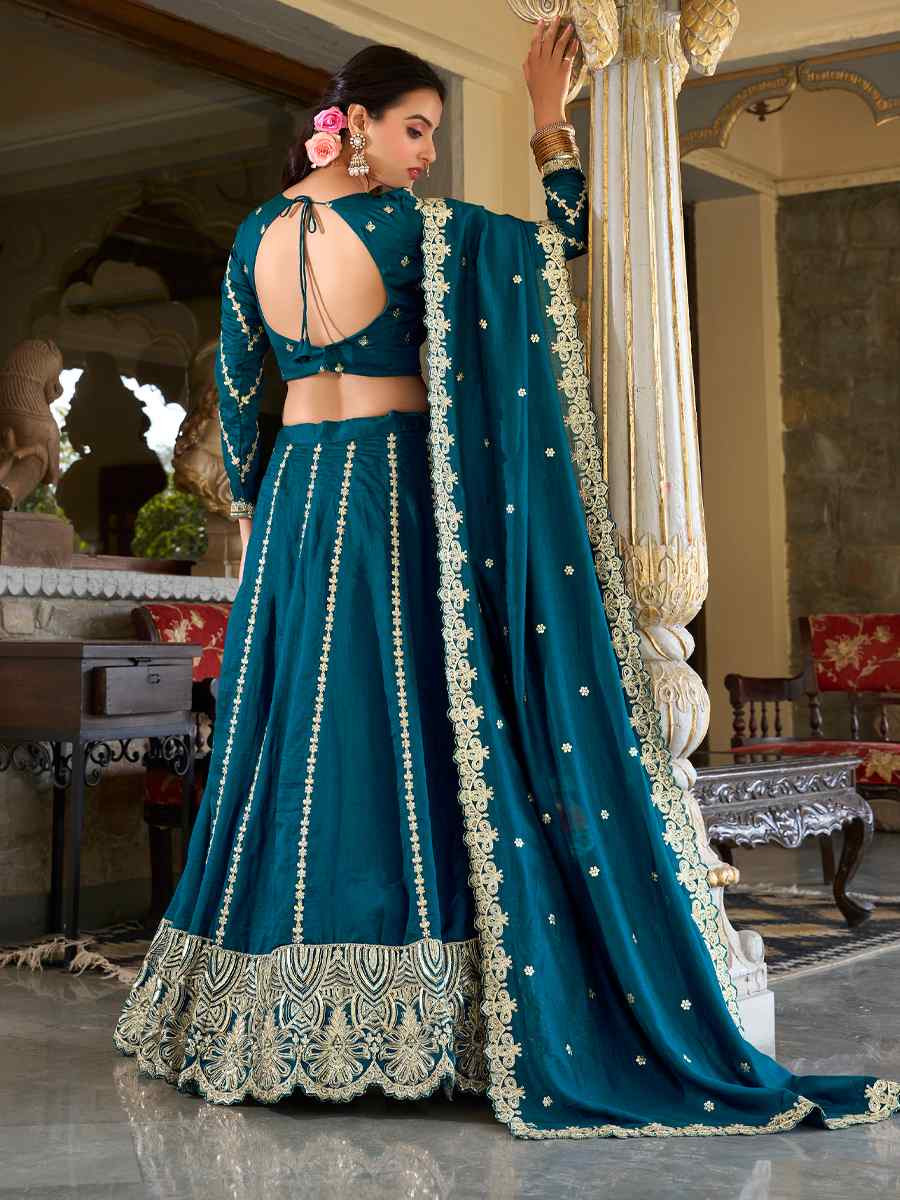 Teal Moonga Silk Embroidery Reception Party Wear Heavy Border Lehenga Choli