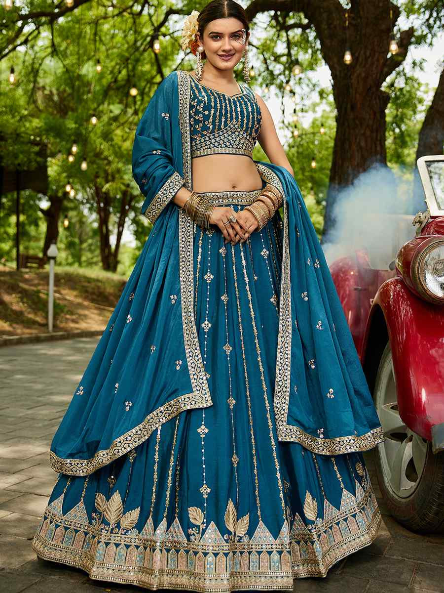 Teal Poly Georgette Embroidered Festival Reception Wedding Party Wear Heavy Border Lehenga Choli