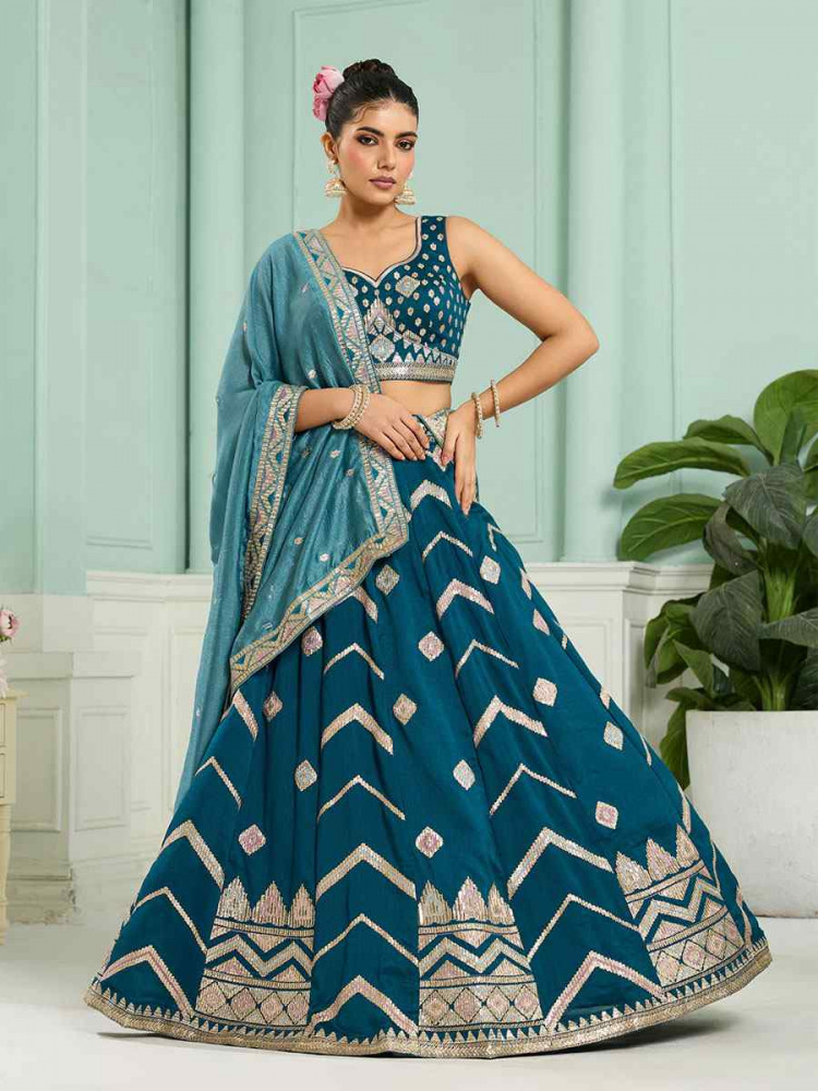 Image of Teal Silk Embroidered Wedding Reception Festival Heavy Border Lehenga Choli