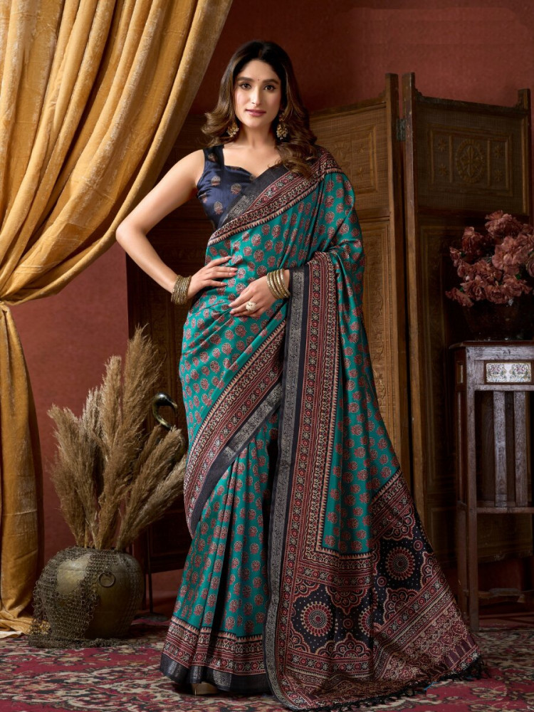 Image of Teal Soft Crepe Silk Printed Wedding Reception Party Casual Heavy Border Sarees