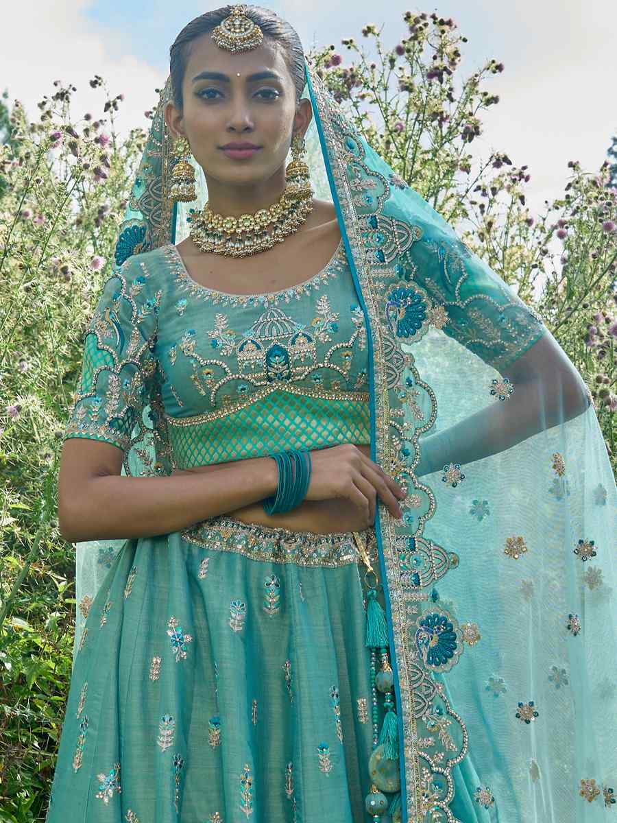 Turquoise Fancy Silk Embroidered Bridal Reception Heavy Border Lehenga Choli