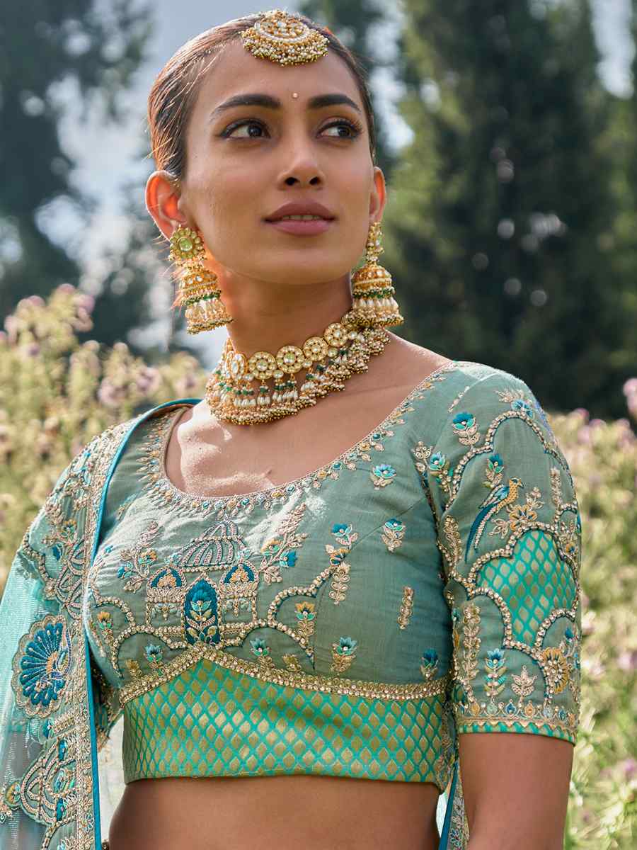 Turquoise Fancy Silk Embroidered Bridal Reception Heavy Border Lehenga Choli