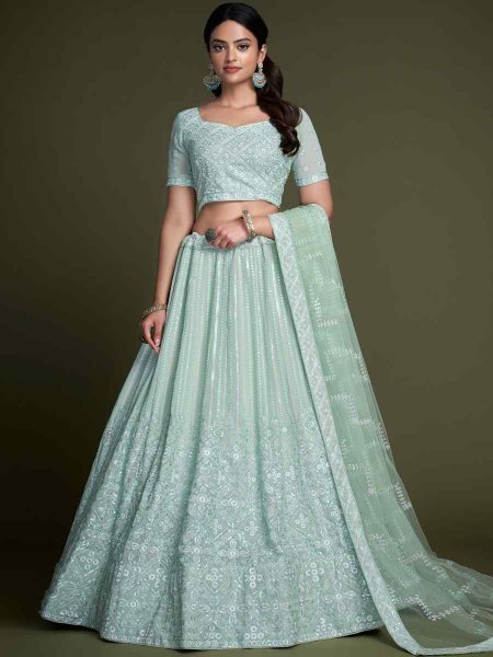 Turquoise Georgette Embroidered Bridesmaid Reception Heavy Border Lehenga Choli