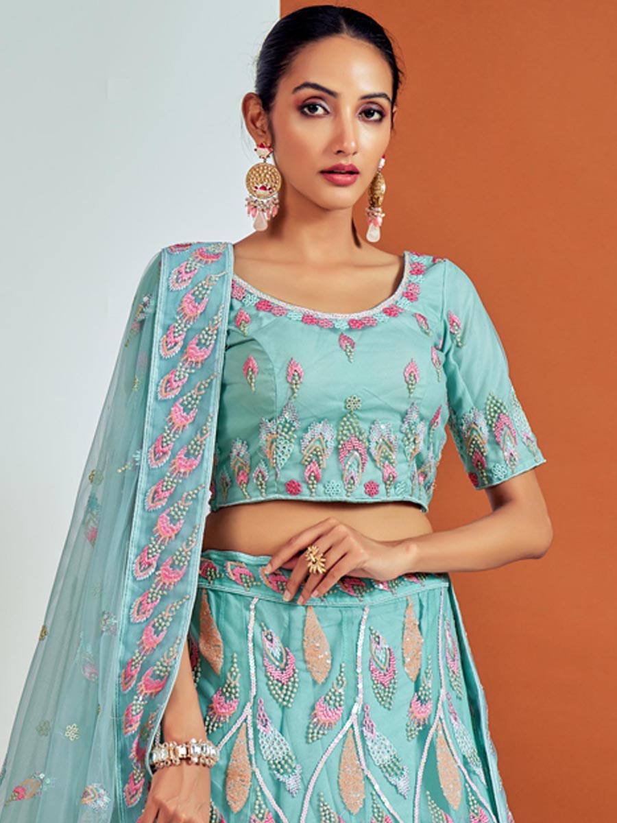 Turquoise Soft Net Embroidered Bridesmaid Wedding Heavy Border Lehenga Choli