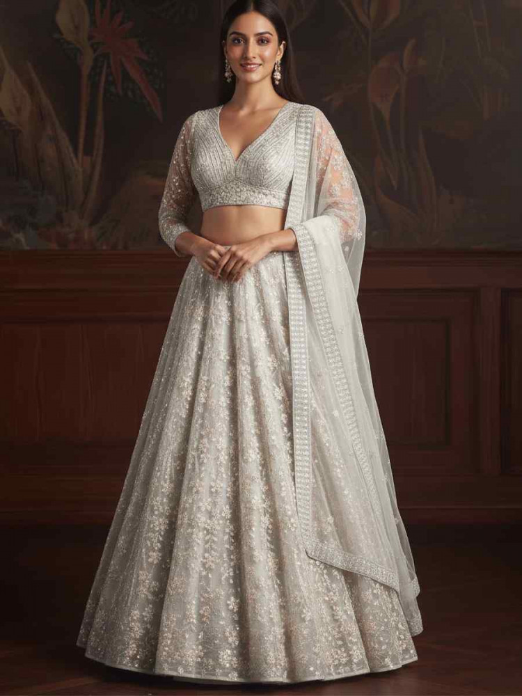 Image of White Net Embroidered Wedding Reception Festival Heavy Border Lehenga Choli