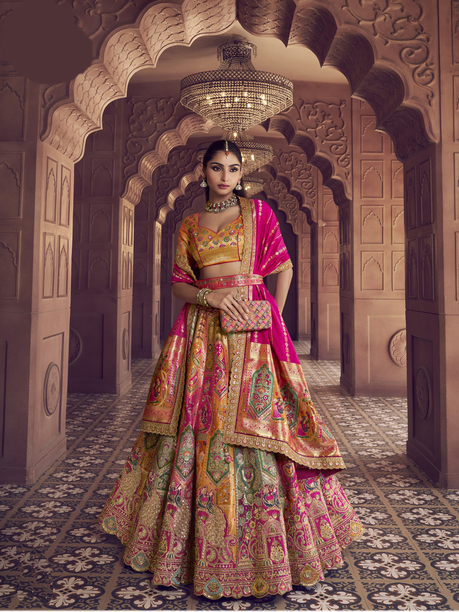 Yellow Banarasi Silk Embroidered Bridal Wedding Reception Festival Heavy Border Lehenga Choli