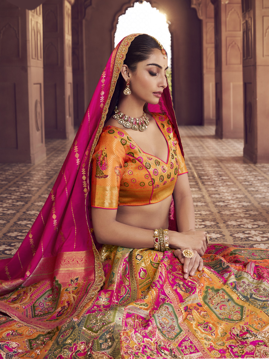 Yellow Banarasi Silk Embroidered Bridal Wedding Reception Festival Heavy Border Lehenga Choli