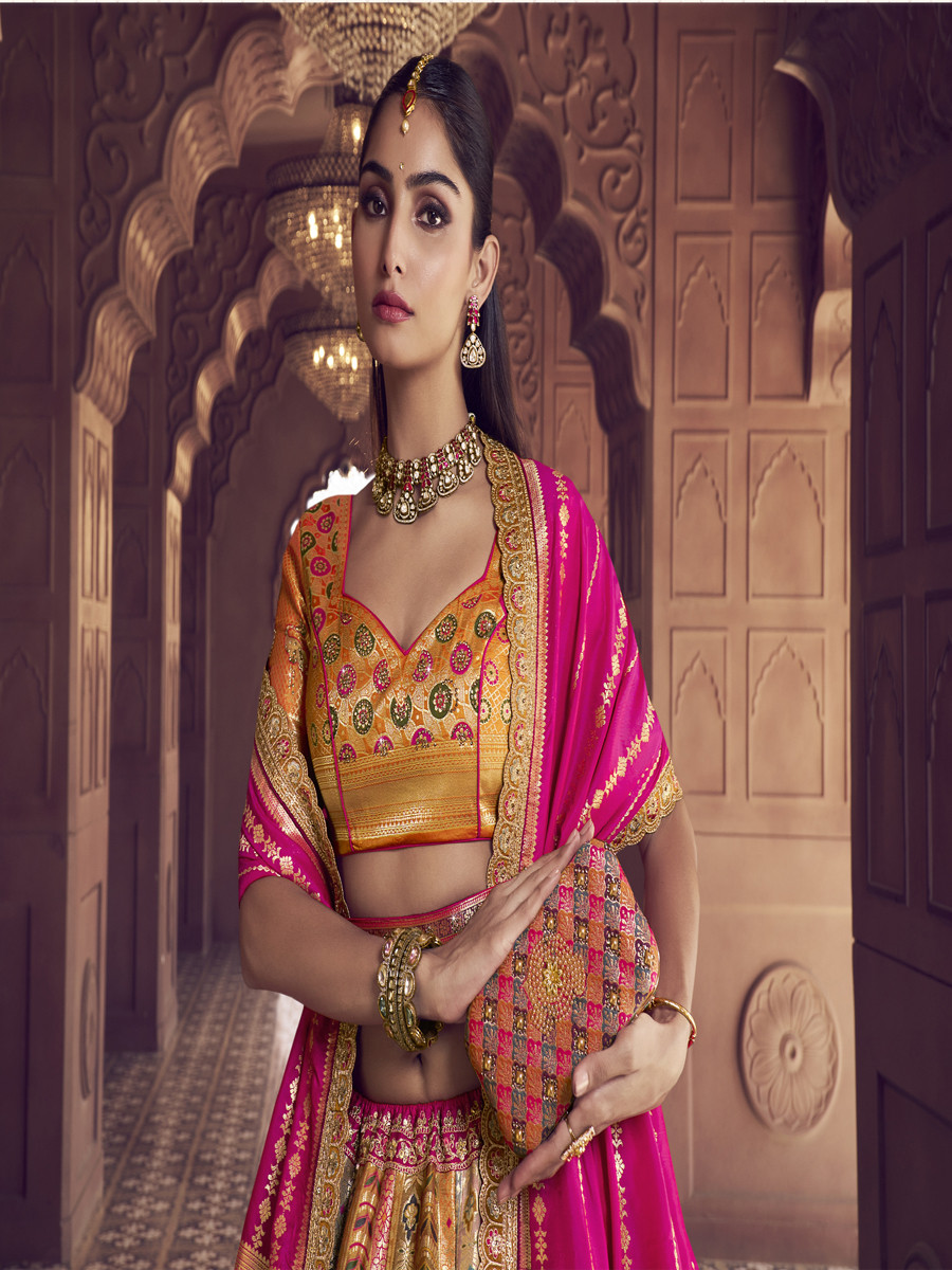 Yellow Banarasi Silk Embroidered Bridal Wedding Reception Festival Heavy Border Lehenga Choli