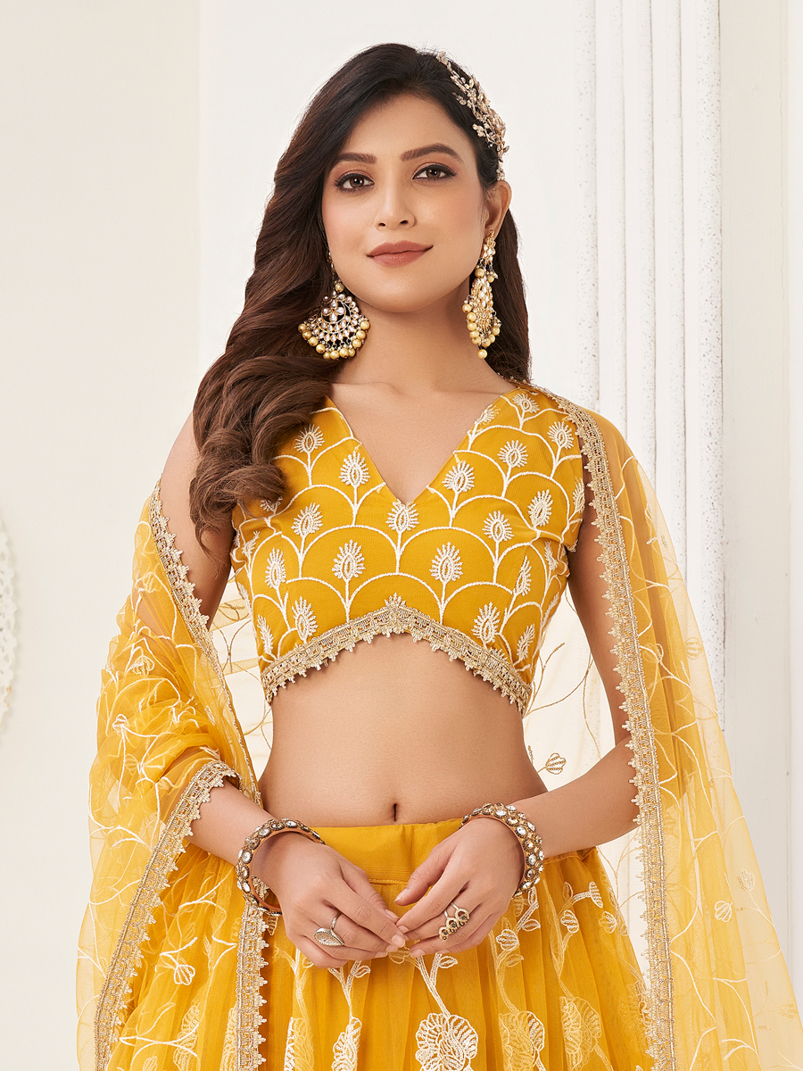 Yellow Butterfly Net Embroidered Party Wear Festival Heavy Border Lehenga Choli