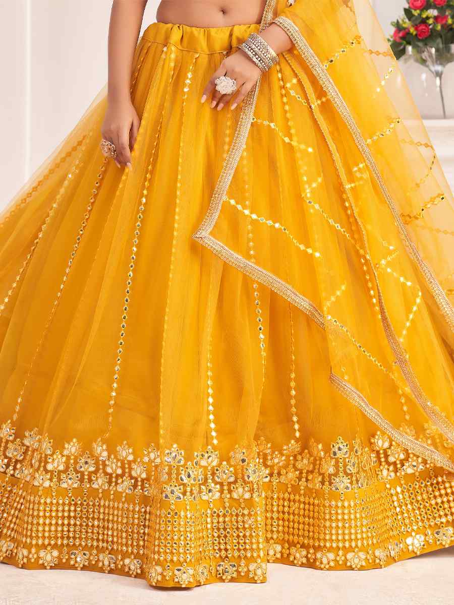 Yellow Butterfly Net Embroidered Party Wear Haldi Heavy Border Lehenga Choli