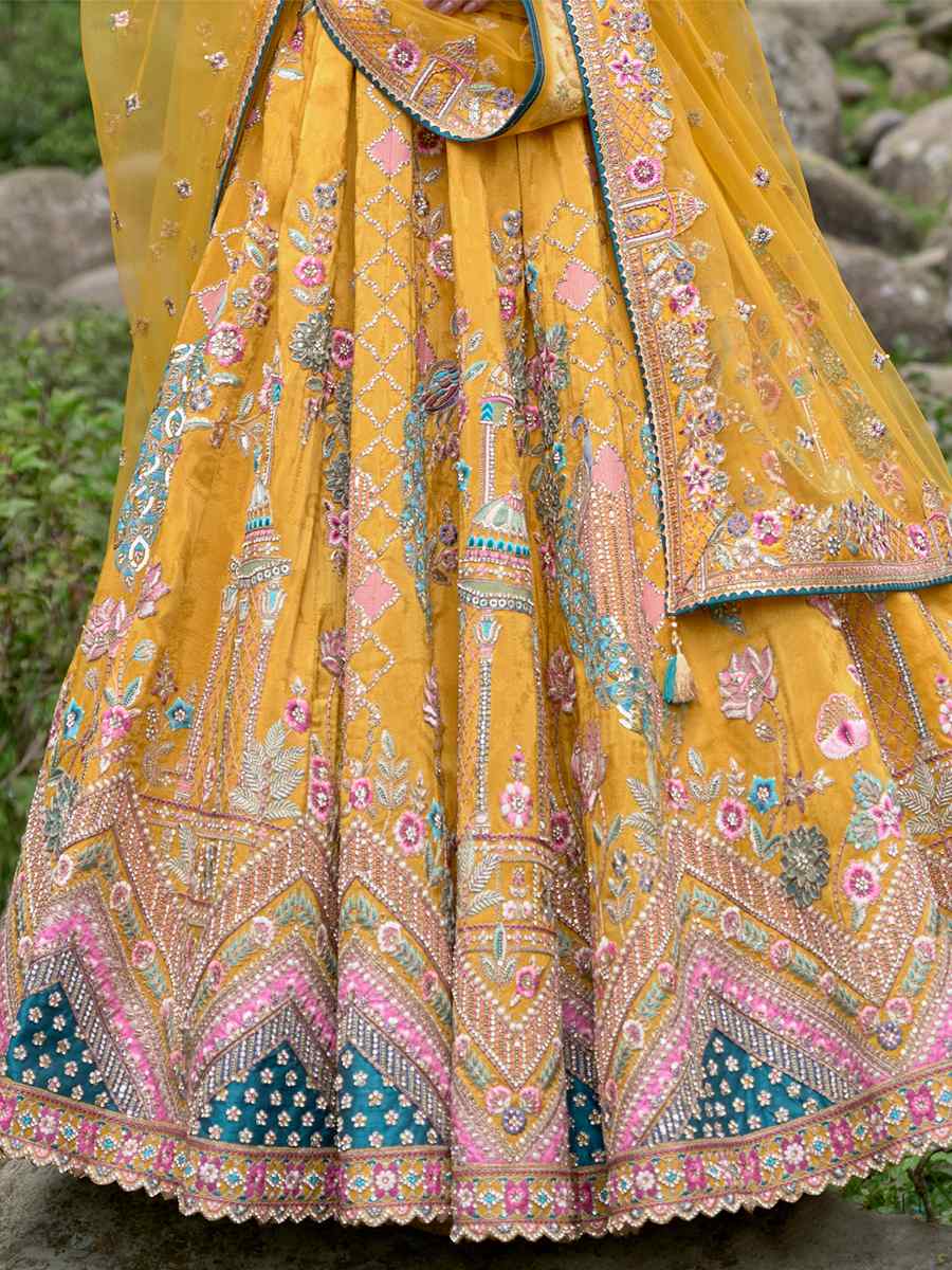 Yellow Fancy Silk Embroidered Bridal Reception Heavy Border Lehenga Choli