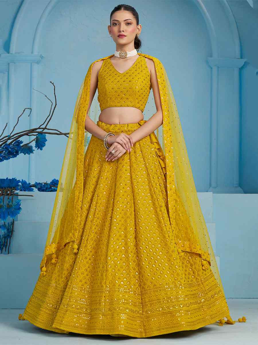 Yellow Georgette Embroidered Reception Wedding Heavy Border Lehenga Choli