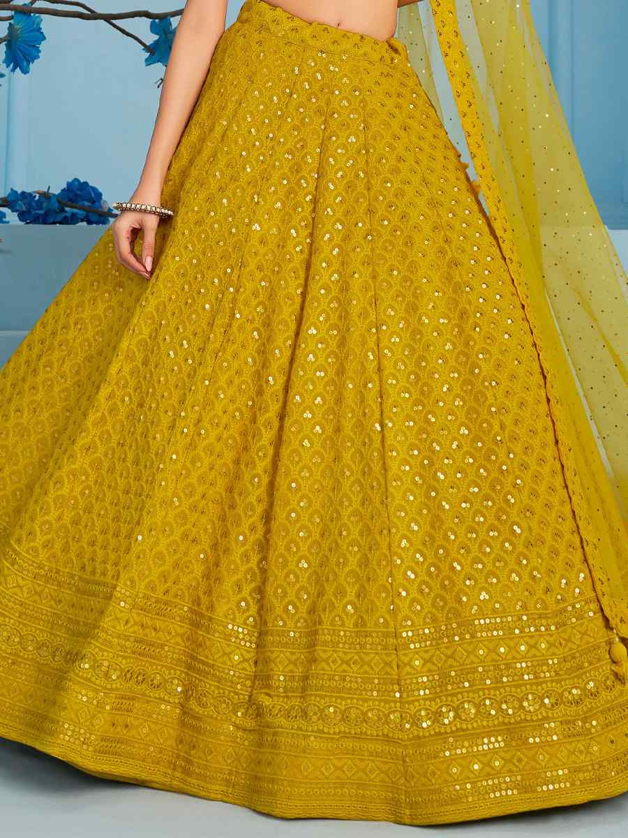 Yellow Georgette Embroidered Reception Wedding Heavy Border Lehenga Choli