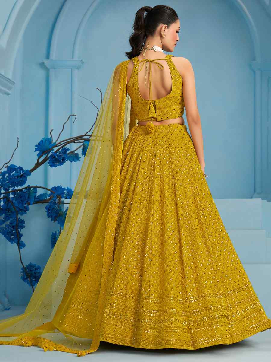 Yellow Georgette Embroidered Reception Wedding Heavy Border Lehenga Choli