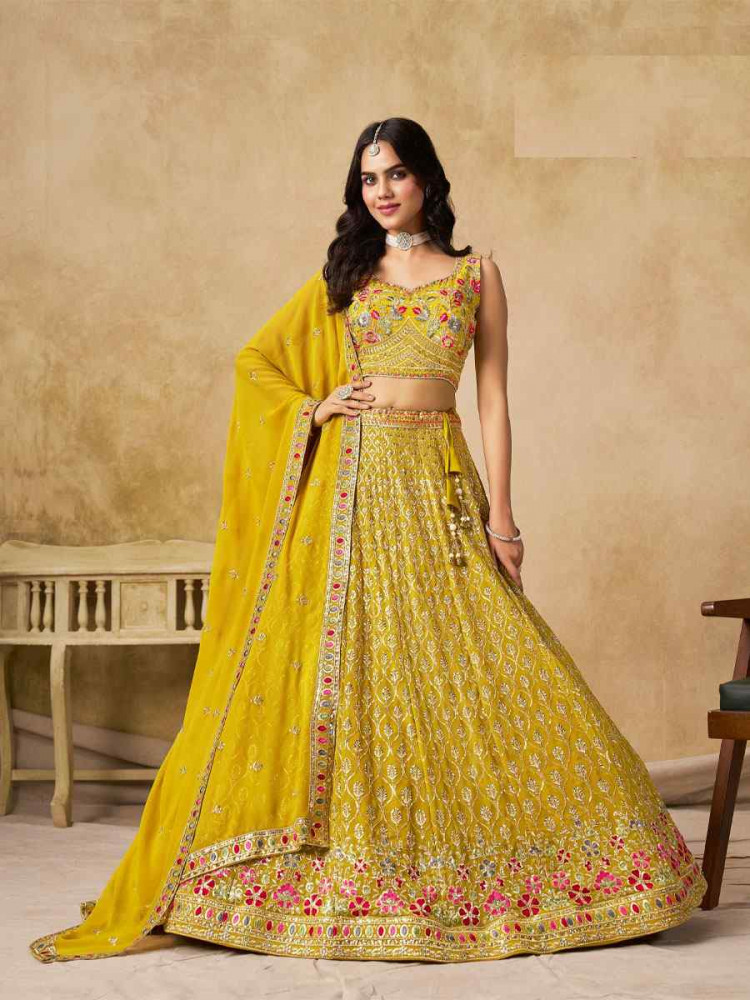 Image of Yellow Georgette Embroidered Wedding Reception Festival Heavy Border Lehenga Choli