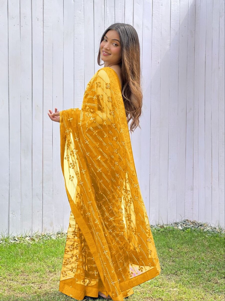 Yellow Heavy Butterfly Net Sequins Wedding Reception Party Festival Heavy Border Sarees