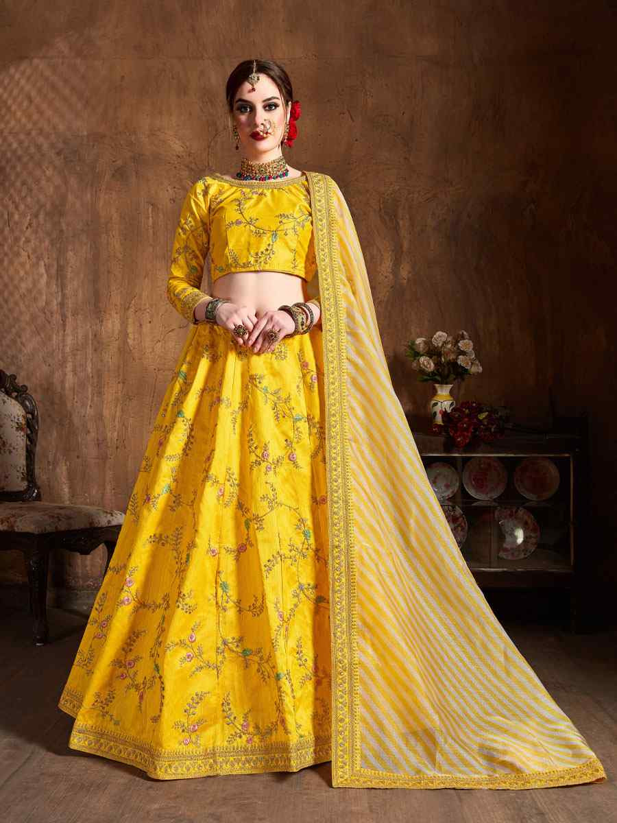 Yellow Mulberry Silk Embroidered Wedding Reception Festival Heavy Border Lehenga Choli