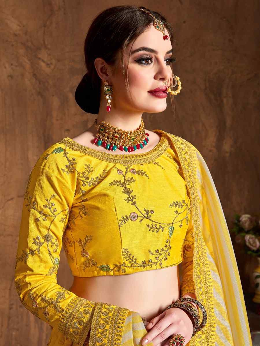 Yellow Mulberry Silk Embroidered Wedding Reception Festival Heavy Border Lehenga Choli