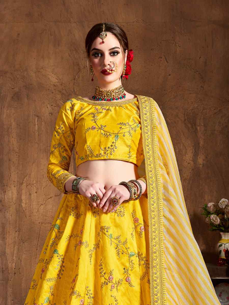 Yellow Mulberry Silk Embroidered Wedding Reception Festival Heavy Border Lehenga Choli