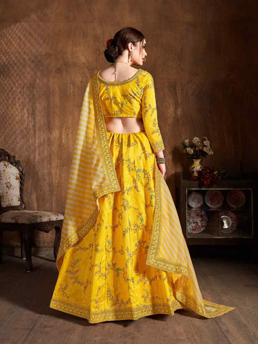 Yellow Mulberry Silk Embroidered Wedding Reception Festival Heavy Border Lehenga Choli
