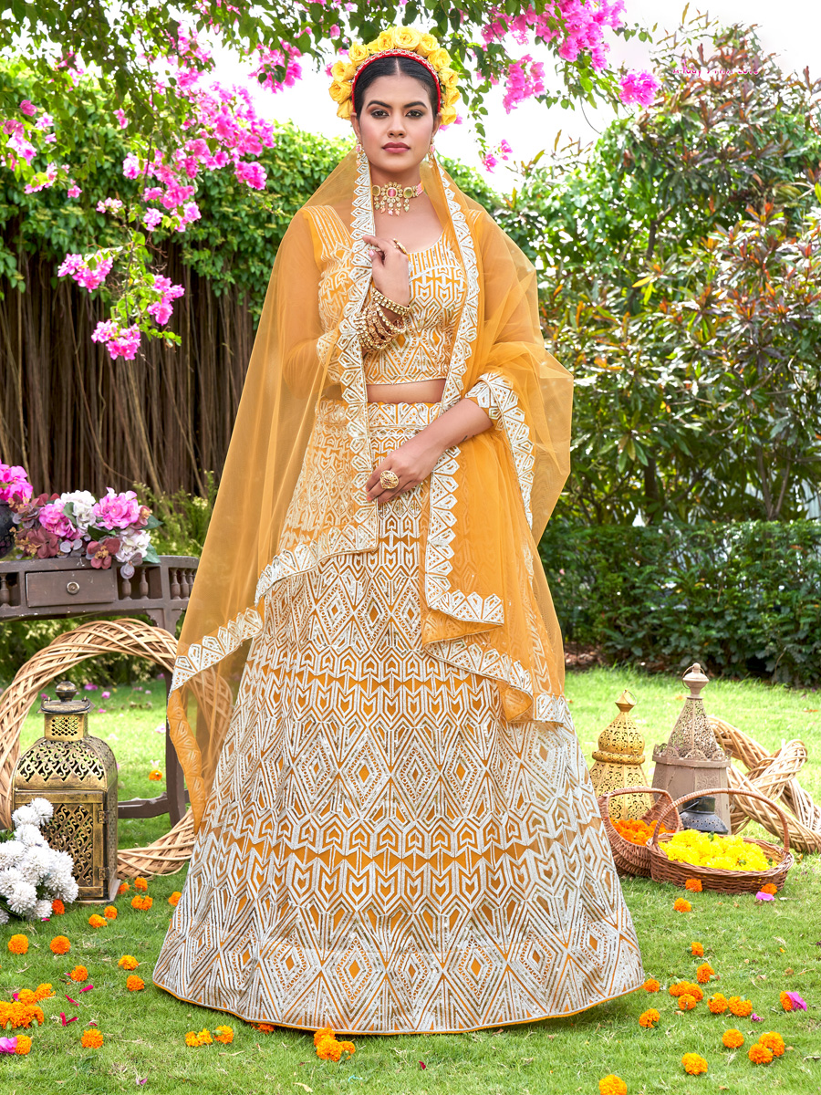Portrait of a beautiful female model in yellow saree with light makeup and  jewelry made of flowers. Its a wedding dress and makeup of Indian bride for  Stock Photo - Alamy