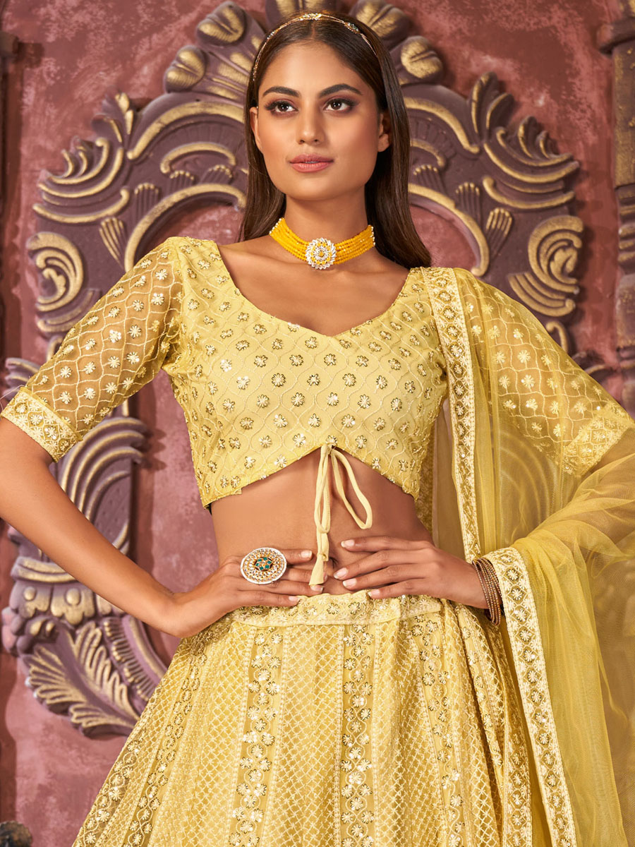 Yellow Net Embroidered Festival Party Wear Heavy Border Lehenga Choli