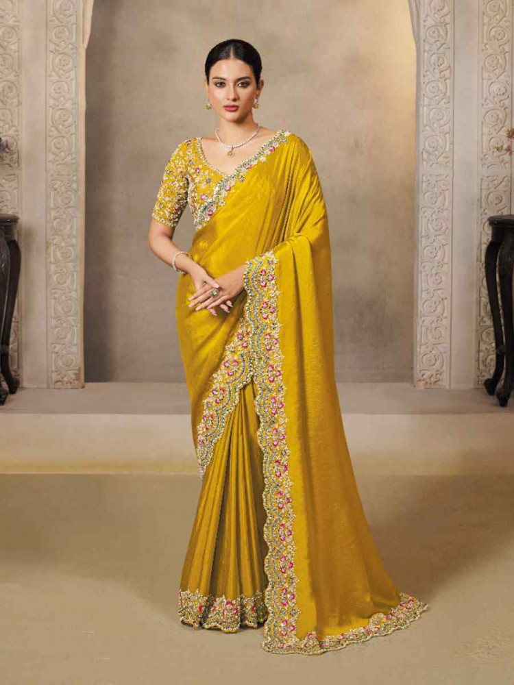 Image of Yellow Soft Satin Silk Embroidery Festival Wedding Fancy Heavy Border Saree